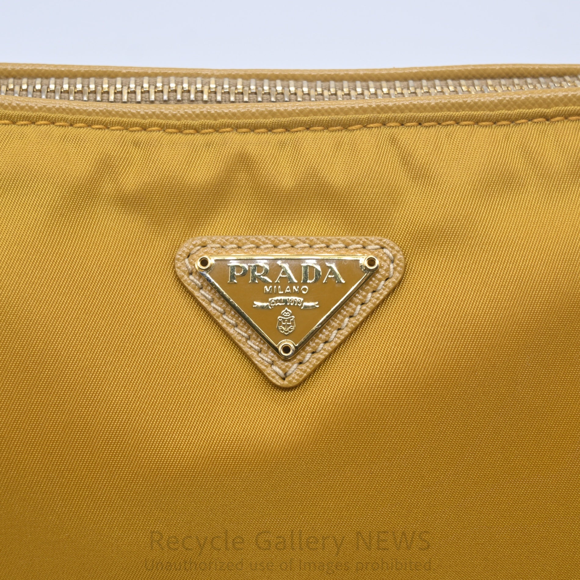 PRADA Triangle Logo Nylon Mini Pouch Mustard Yellow / プラダ ナイロンポーチ ミニバッグ ハンドバッグ マスタードイエロー