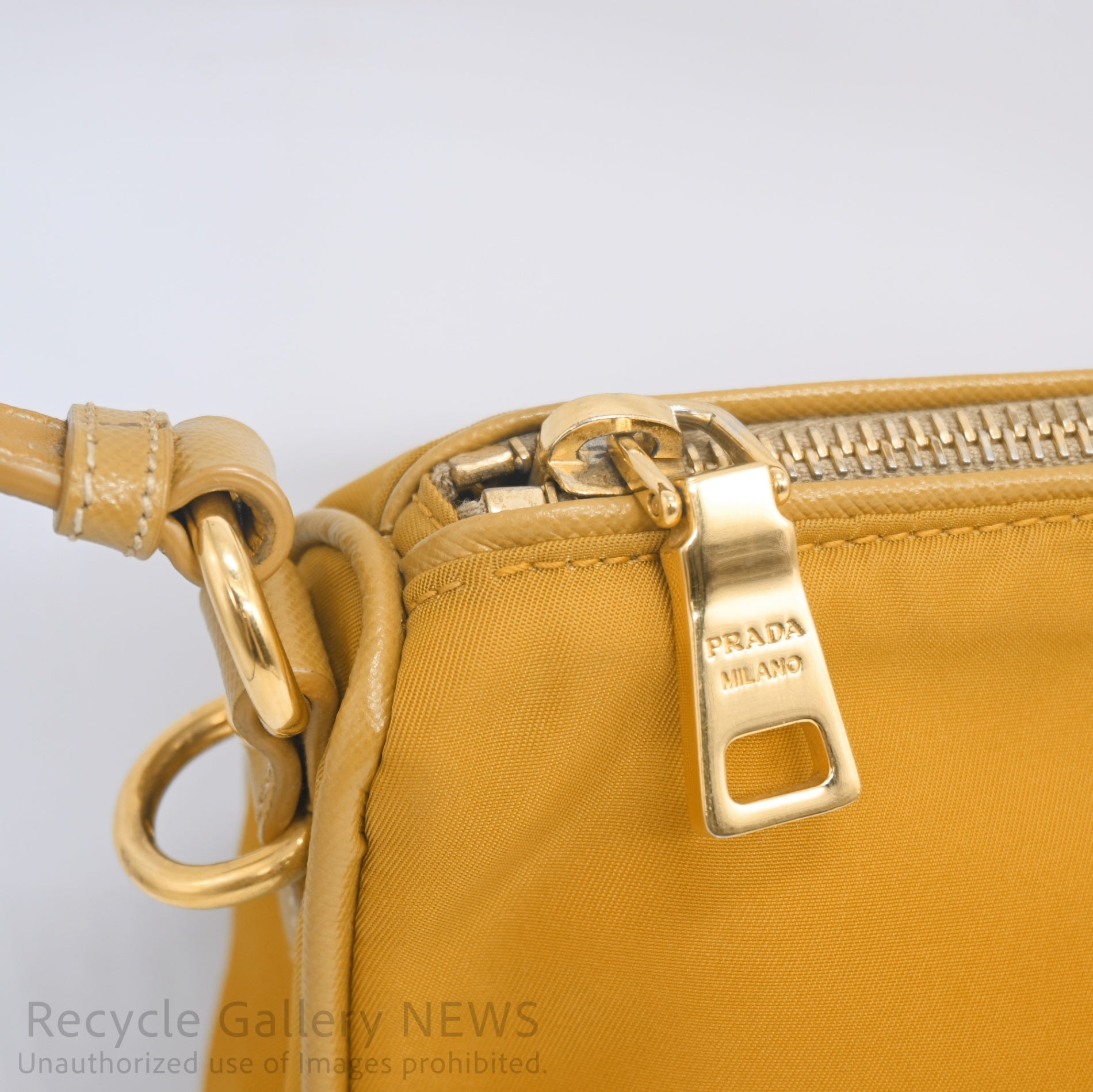 PRADA Triangle Logo Nylon Mini Pouch Mustard Yellow / プラダ ナイロンポーチ ミニバッグ ハンドバッグ マスタードイエロー