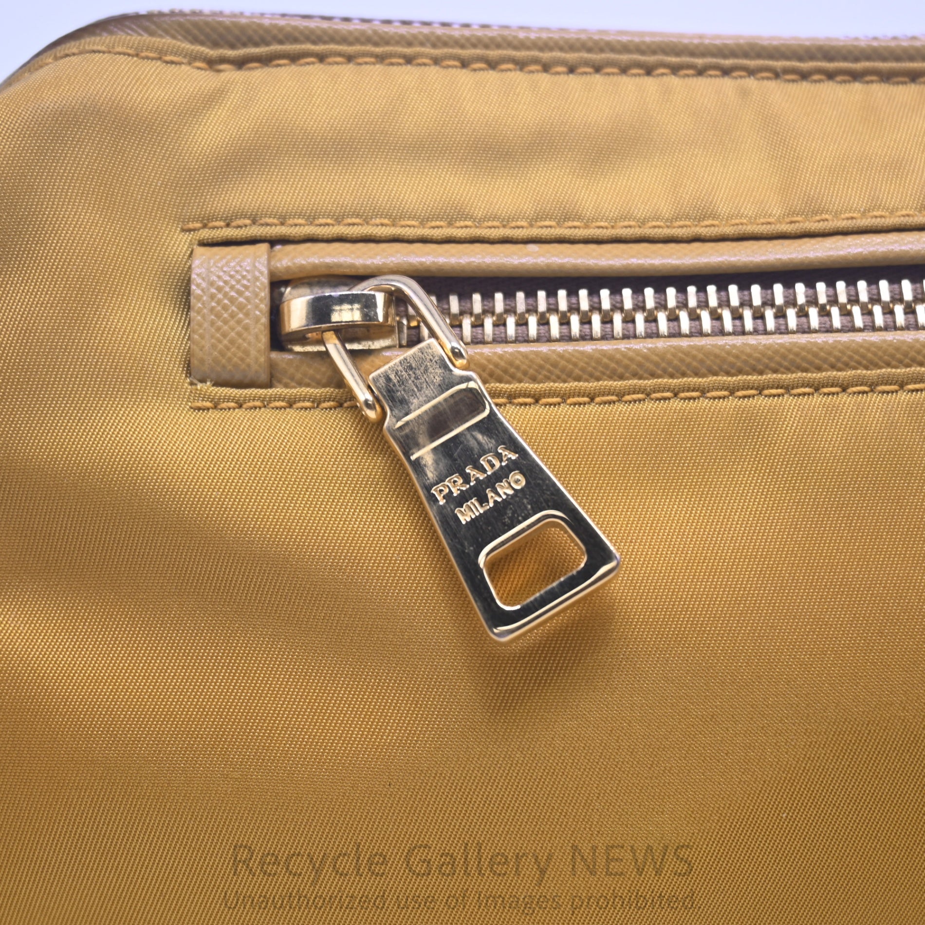 PRADA Triangle Logo Nylon Mini Pouch Mustard Yellow / プラダ ナイロンポーチ ミニバッグ ハンドバッグ マスタードイエロー